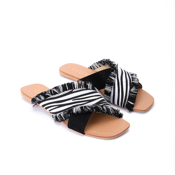 ZEBRA CRISS CROSS SLIPPERS